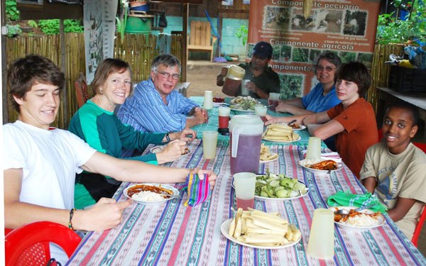 Islanders have lunch at an organic farm in Guatemala during a Rotary trip last July. From left to right: Maximo Mandl
