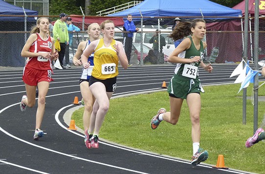 Eva Anderson makes her move to take second place in the 800 meter race last Saturday.