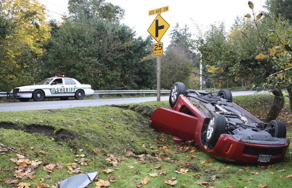A Mazda 4 drove off the road and flipped on Vashon Highway near the intersection with 103rd Avenue Wednesday morning. The driver was reported to have only minor injuries.