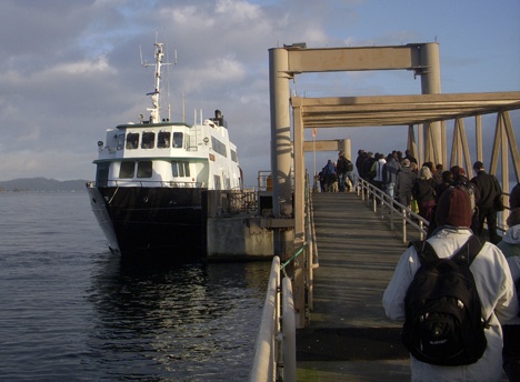 Riders board the passenger-only ferry.