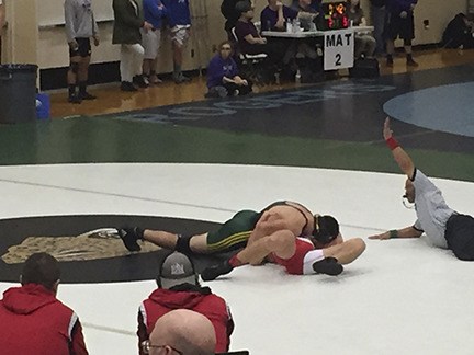 Chester Pruett pins his Cascade Christian opponent in the second round.