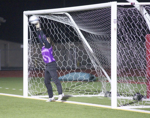 Pirate goalkeeper Larissa Kuhns stops Orting's fourth penalty shot to give Vashon an entry to the State Tournament.