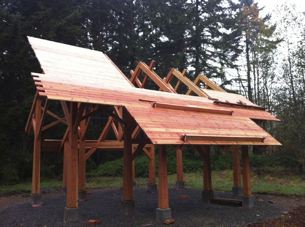 The new structure at Island Center Forest is being built largely with wood from the Island
