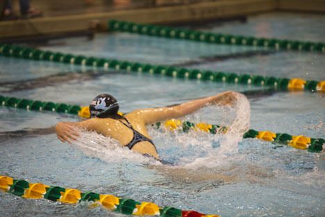 Seal Anna Lueck competes in the 100-yard butterfly event.