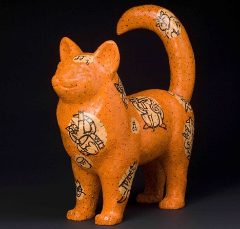 This fiberglass cat was embellished by Brian Fisher.