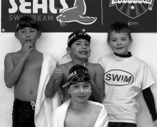 These four Seals placed first in their 4x50-yard medley relay. They are