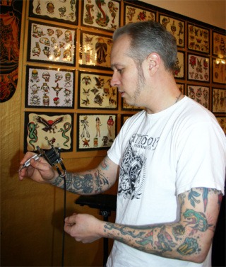 Paco Rollins demonstrates how his hand-built tattoo machines work.