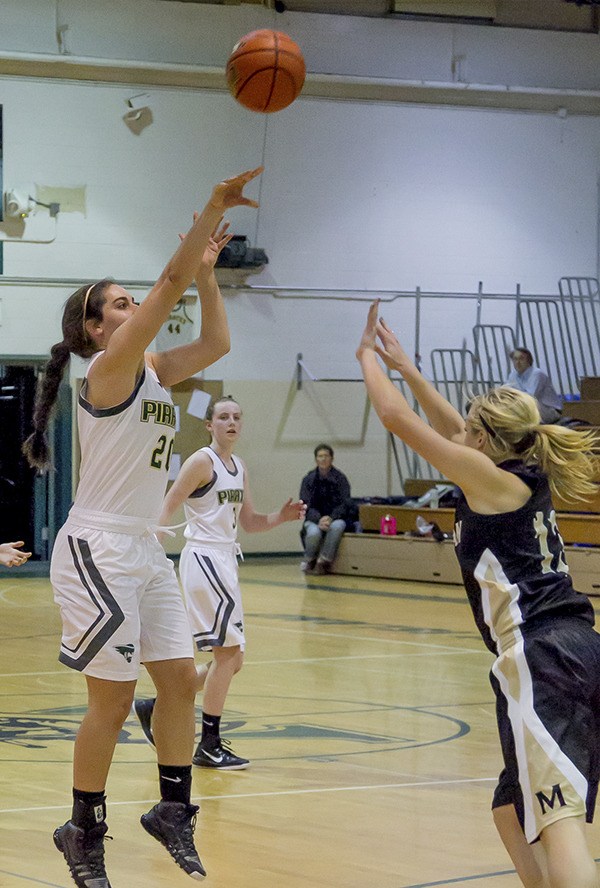 Siena Jannetty hits a 3-pointer in the closing moments of Thursday’s home opener against Meridian High School