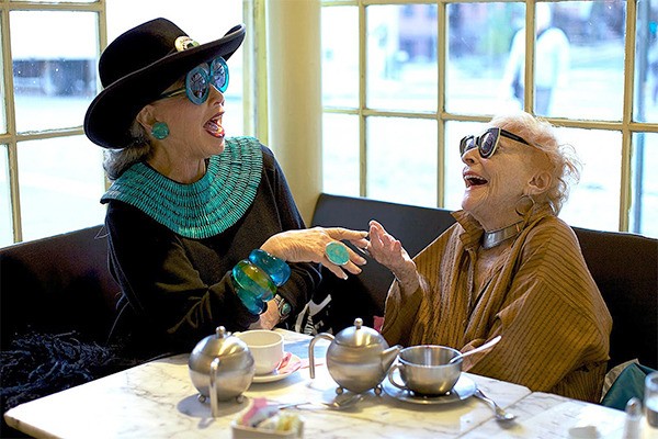 Two women profiled in the documentary “Advanced Style” enjoy a laugh about ageless fashion.