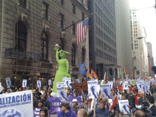 Lady Liberty led the way at a May Day march in Chicago