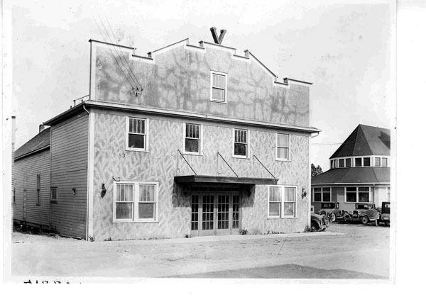 A 1930s photo shows the original Vashon Theatre