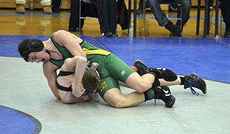 Freshman Bryce Hoisington wrestles en route to a win and a third-place finish at the recent sub-regionals competition.