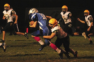 Nathan Lawson goes in for a tackle in Friday night’s game.