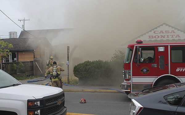 Firefighters respond to a fire in downtown Vashon.