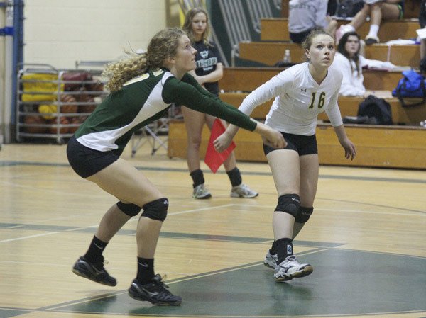 It’s eyes on the ball as Bryn Justis handles a serve and Kendall Danzer
