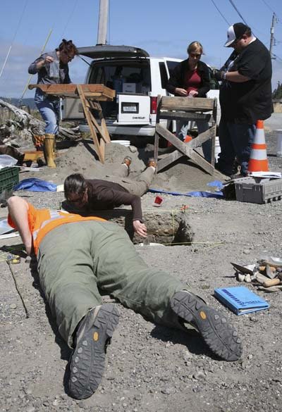 Archeologists and volunteers work on an excavation in Manzanita.