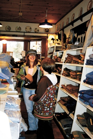 Karen Gale and her son Grayson shop for hats at the Country Store & Gardens.