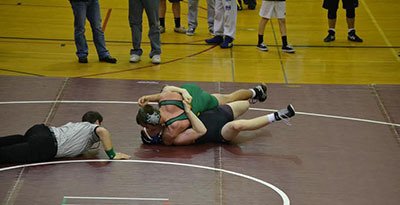 Vashon's Shane Armstrong pins his opponent at Saturday's tournament.