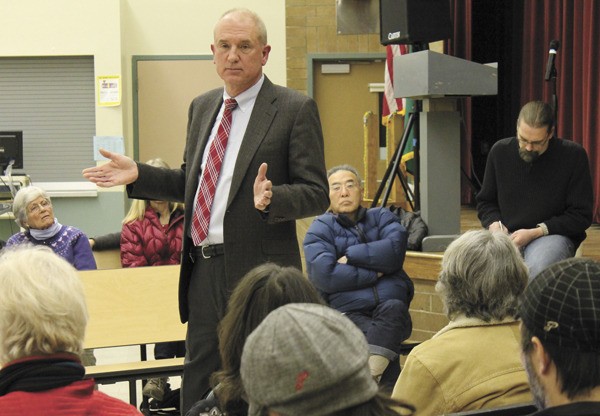King County Sheriff John Urquhart answers questions at the community council meeting Monday night.