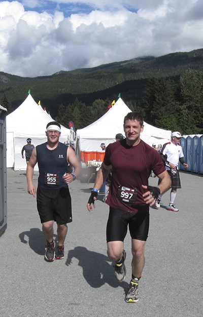 Josiah and Nathanael Thalhofer making the transition to the marathon portion of the Whistler