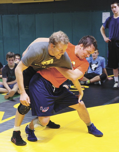 Anders (left) and Per-Lars Blomgren wrestle each other during a practice early last season.