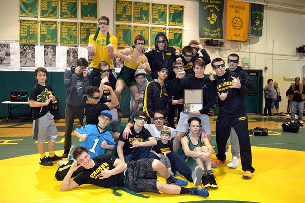 The Vashon wrestlers celebrate after their dominating performance on Saturday.