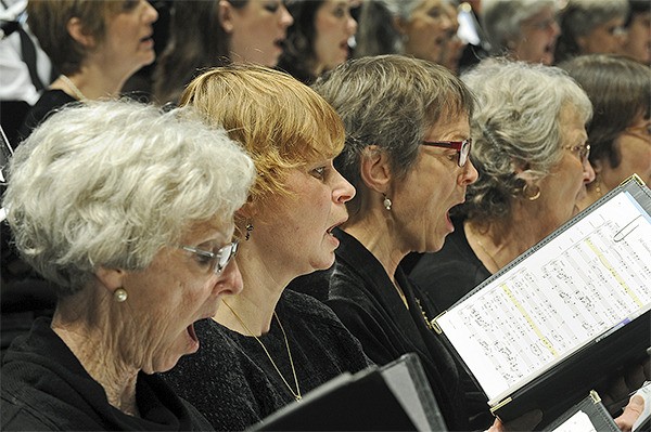 Chorale members perform at a recent concert. The group will have two holiday concerts this weekend.