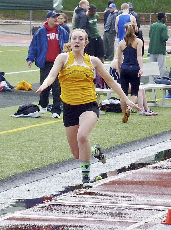Emily Browne bounds in the triple jump at the Tacoma Invitational last weekend.