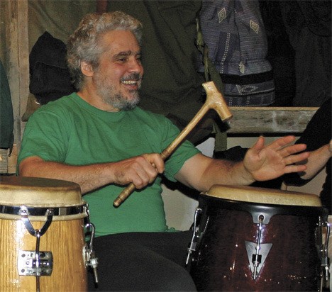 Geoff Johns plays a rhythm during a drumming and singing circle on Thursday night.