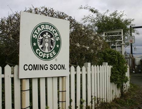A sign announcing the arrival of a Starbucks stand appeared next to the north-end ferry terminal today
