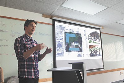 Cory Castagno presents an idea for the Farmers Market at a meeting last week.