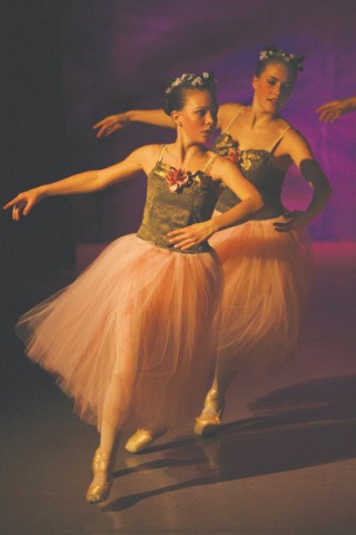 Camille Kappelman and Clarissa Boyajian dance in the “Waltz of the Flowers.”