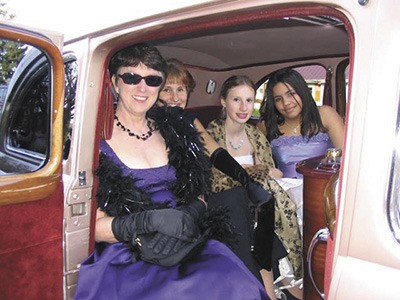 'Stars' dressed for the gala take a ride in the event limo at last year's Oscar Night party.