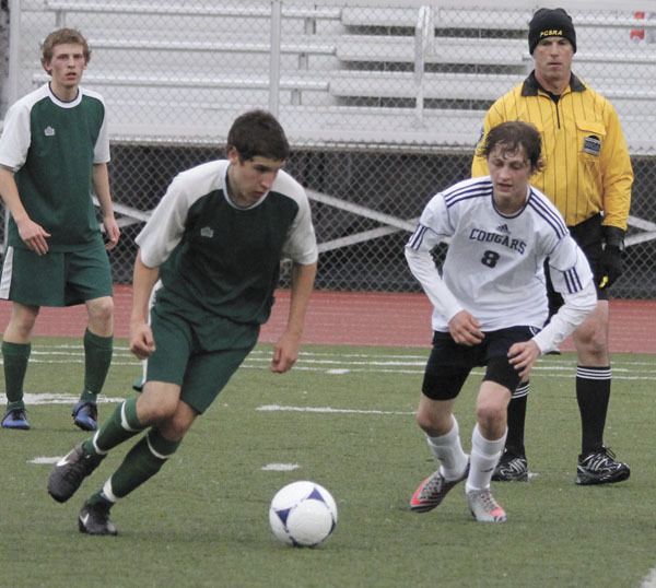 Brazilian exchange student Victor Moreira (left) scored three of seven goals Vashon earned in Tuesday’s game against Cascade Christian. Behind him is Van Ralston.