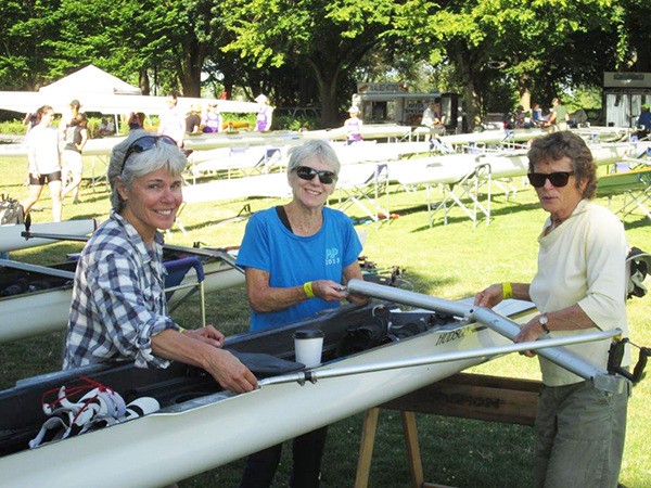 Vashon’s lightweight women rig the boat they would later row to a gold medal. From left are Celia Congdon