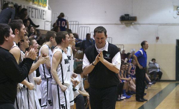 Pirate coach Andy Sears and the Vashon bench celebrate in sharp contrast to coach Jim Eldridge and the Chimacum bench