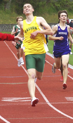 Colin Andrus knows he has qualified for the state track meet as he crosses the finish line in the 800 meters at Saturday’s Tri-District meet.