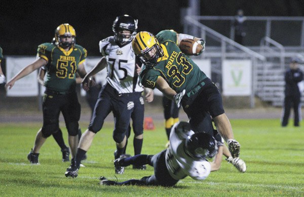 Pemberton’s Tim Ravenna can’t stop Vashon sophomore Nathan Lawson from crossing the goal line for the Pirates’ first touchdown in their first win of the season