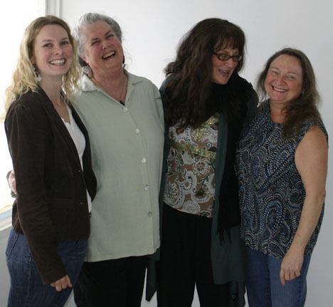 Vashon Intuitive Arts coordinators take a break from renovating their new space. They are