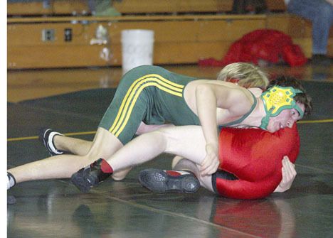 Senior Tucker Lazare gets two points for a reversal over Orting's Keegan Norris in their 171-pound match.