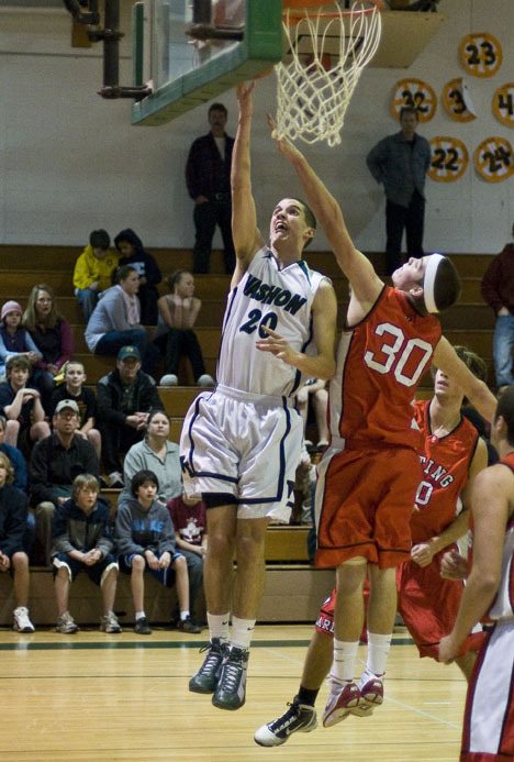 Alex Wegner lays the ball up past the Orting Cardinals during the Jan. 29 game. Vashon defeated Orting