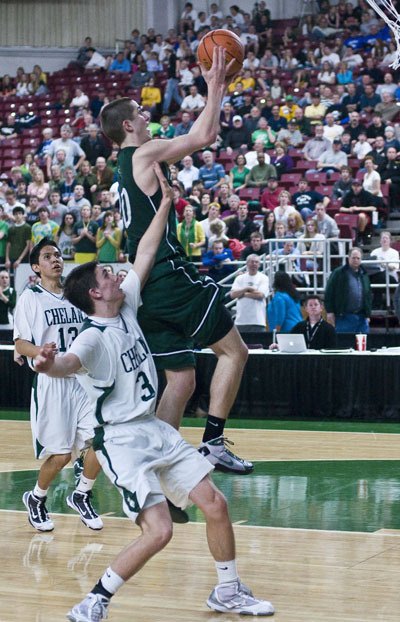 Alex Wegner slashes to the basket past the top-ranked Chelan Goats in the opening game of the state tournament.