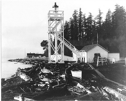 An 1894 photo shows the 31-foot light platform that was constructed to house the original light. The fog signal building is next to the tower