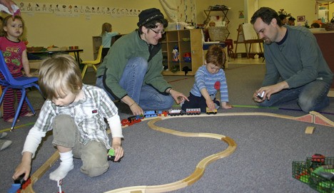 Playing with trains at Vashon-Maury Cooperative Preschool are