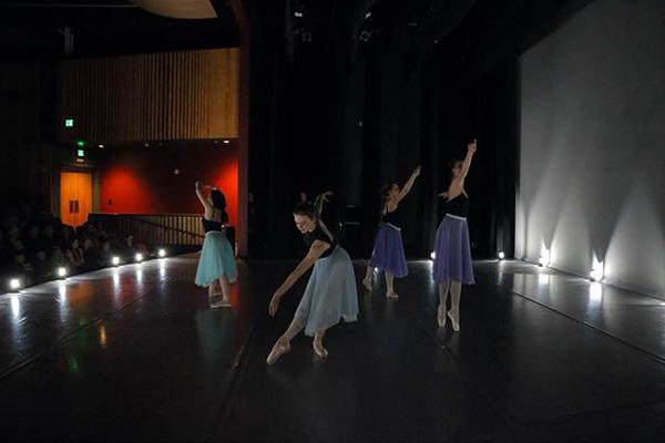 “Original Works” dancers perform despite a power outage.