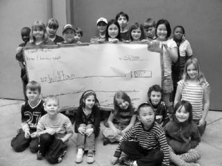 LIGHTING THE WAY TO WOLFTOWN: Mrs. Wilson’s multi-age class at Chautauqua raised $365 to donate to Wolftown. With the help of their student teacher Wendy Finkleman and parent volunteers