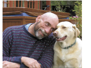 Larry Flynn shares a moment with his dog