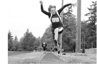 Seventh-grader Nick Betz takes on a long jump.