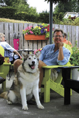 Will North and his partner's dog Vada can often be spotted at the Burton Coffee Stand.