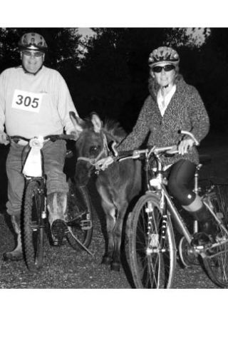 These muck boot triathletes cross-train with a mini donkey named Pepper.